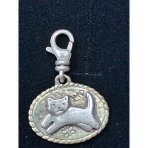 Silpada Vintage cat charm in sterling silver & brass. Rare excellent condition.